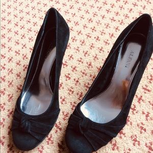 Black genuine suede pumps.